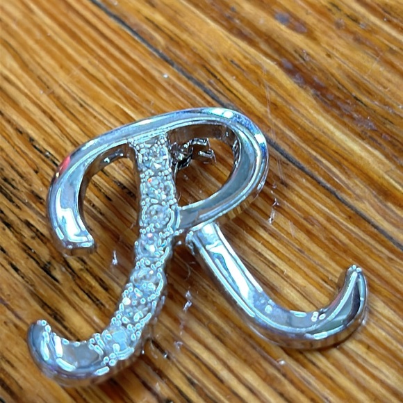 Assorted costume jewelry.  Includes 8 pieces. Seven pins and 1 bracelet. - Picture 7 of 10